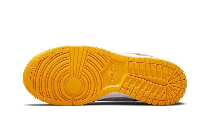 Nike Dunk Low University Gold – limitierter Sneaker bei Shade Studios